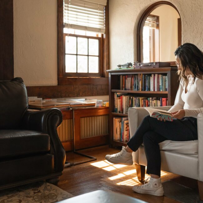 young woman reading a book | Hidden River residential eating disorder treatment center