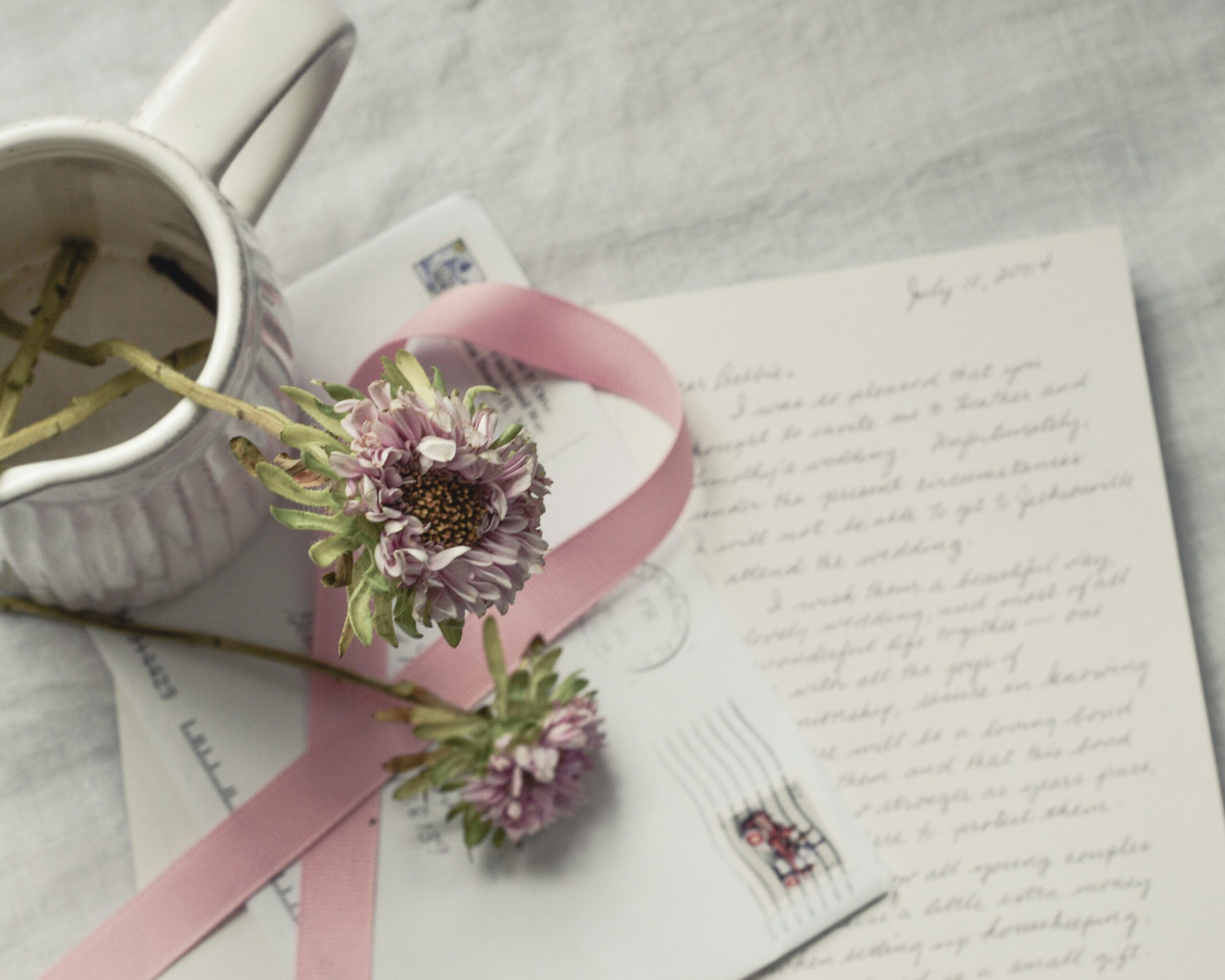 a cup of tea, flower, and letter | hiddenriverhealing.com